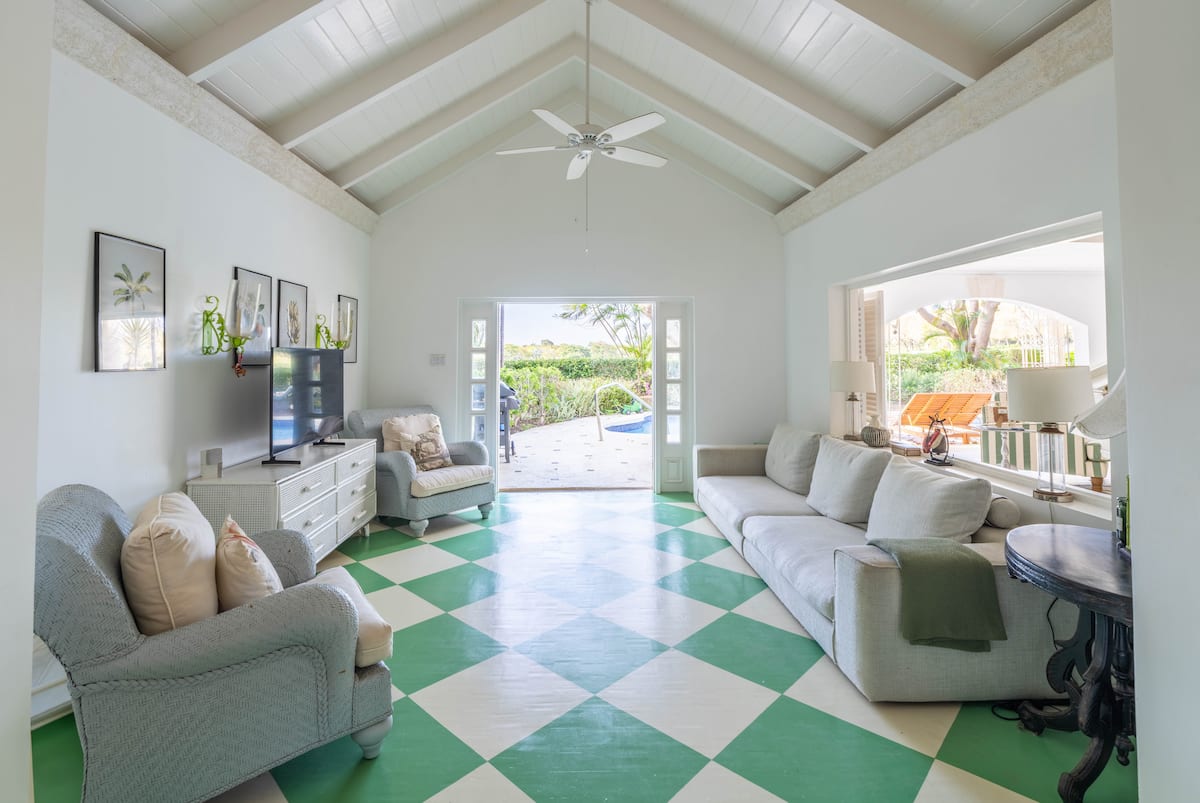 Sitting room with a distinctive green-and-white checkerboard floor
